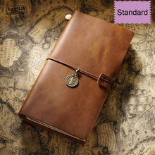 Brown leather journal with a decorative clasp on an old map background